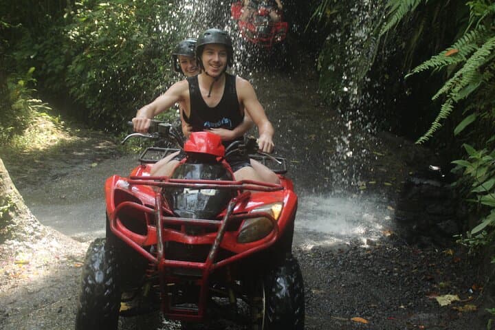 ATV Quad Bike Through Tunnel and Waterfall — photo 1 of 24