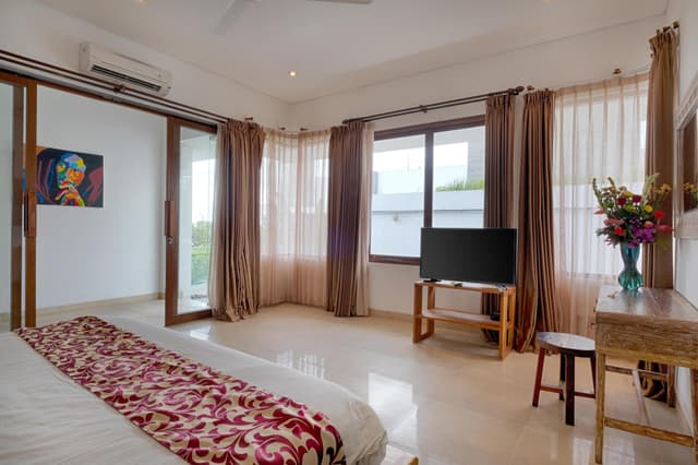 Three-Bedroom Beachfront Villa with Private Pool