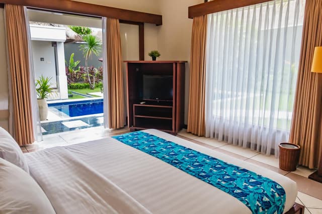Four-Bedroom Villa with Private Pool and Garden