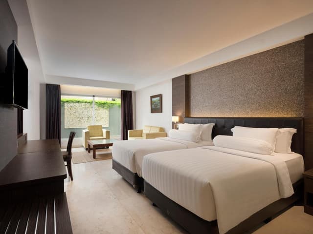 Deluxe Family King Room, with FREE daily shuttle to Ubud City, FREE Photo Session, FREE Art Gallery Visit, 24-hour access to Fitness Center, FREE Welcome Drink, and FREE Kids Activities.