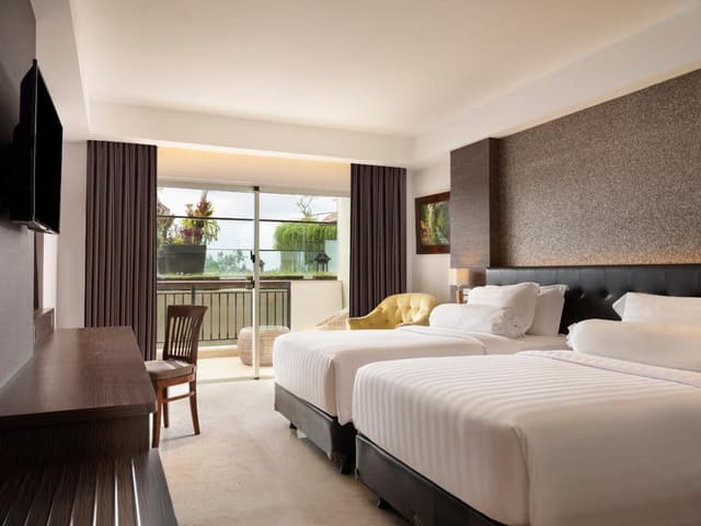 Deluxe Twin Balcony Room with Vertical Garden View, with FREE daily shuttle to Ubud City, FREE Photo Session, FREE Art Gallery Visit, 24-hour access to Fitness Center, FREE Welcome Drink, and FREE Kids Activities.