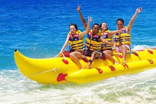 Water Sports (Jet Ski, Banana, Parasailing) & Uluwatu with Kecak