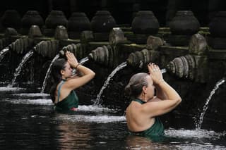 Peaceful Morning Tirta Empul Temple Water Purification Ceremony